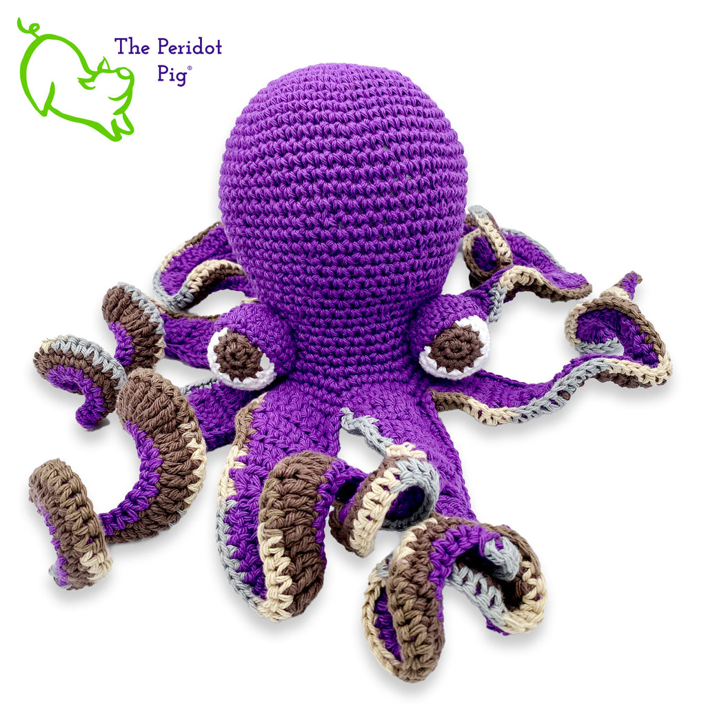 My husband thought an octopus only comes in black but we begged to differ! The North Pacific Giant Octopus is a lovely shade of orange like our Olivia. At first glance, she's a bit intimidating but in reality, she is soft and cuddly. Olivia is made from sturdy cotton and is meant to last a life-time. Also available in a purple too! Front view shown in purple.