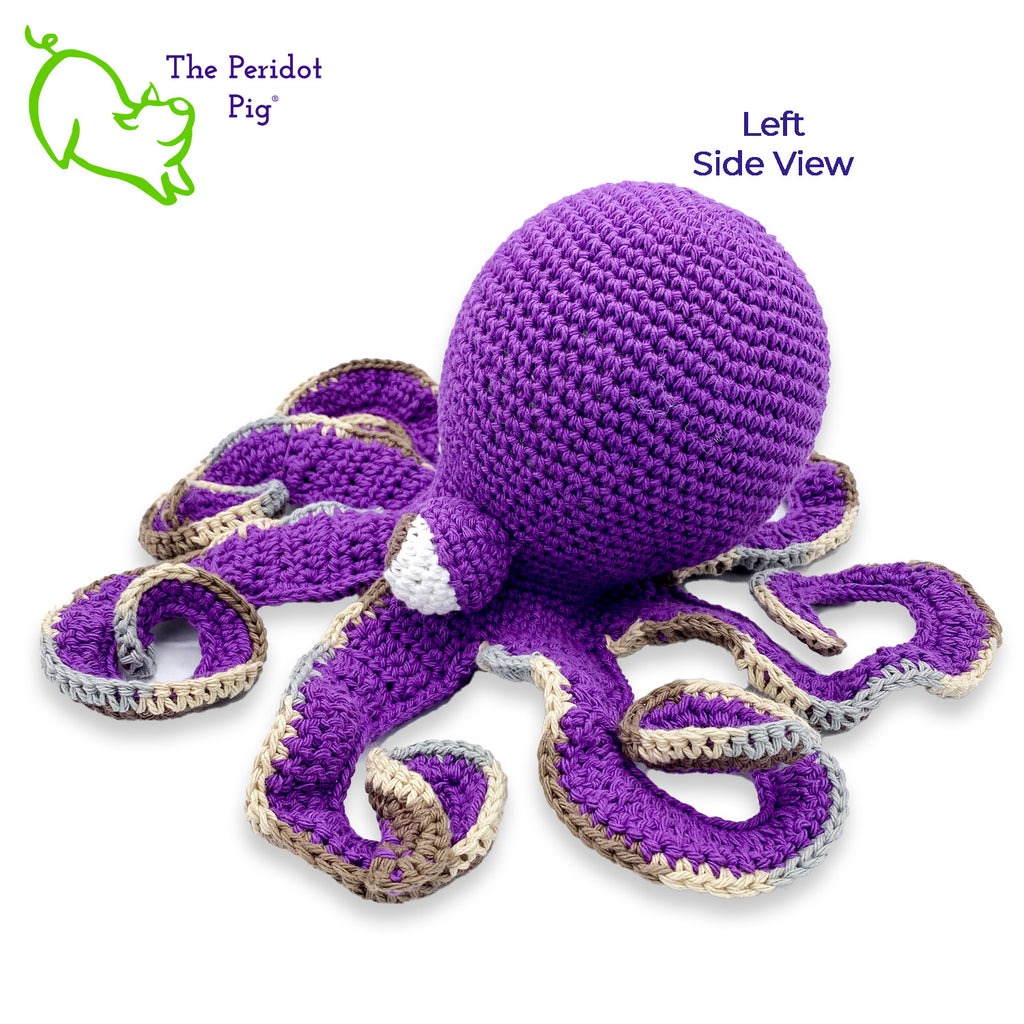 My husband thought an octopus only comes in black but we begged to differ! The North Pacific Giant Octopus is a lovely shade of orange like our Olivia. At first glance, she's a bit intimidating but in reality, she is soft and cuddly. Olivia is made from sturdy cotton and is meant to last a life-time. Also available in a purple too! Left view shown in purple.