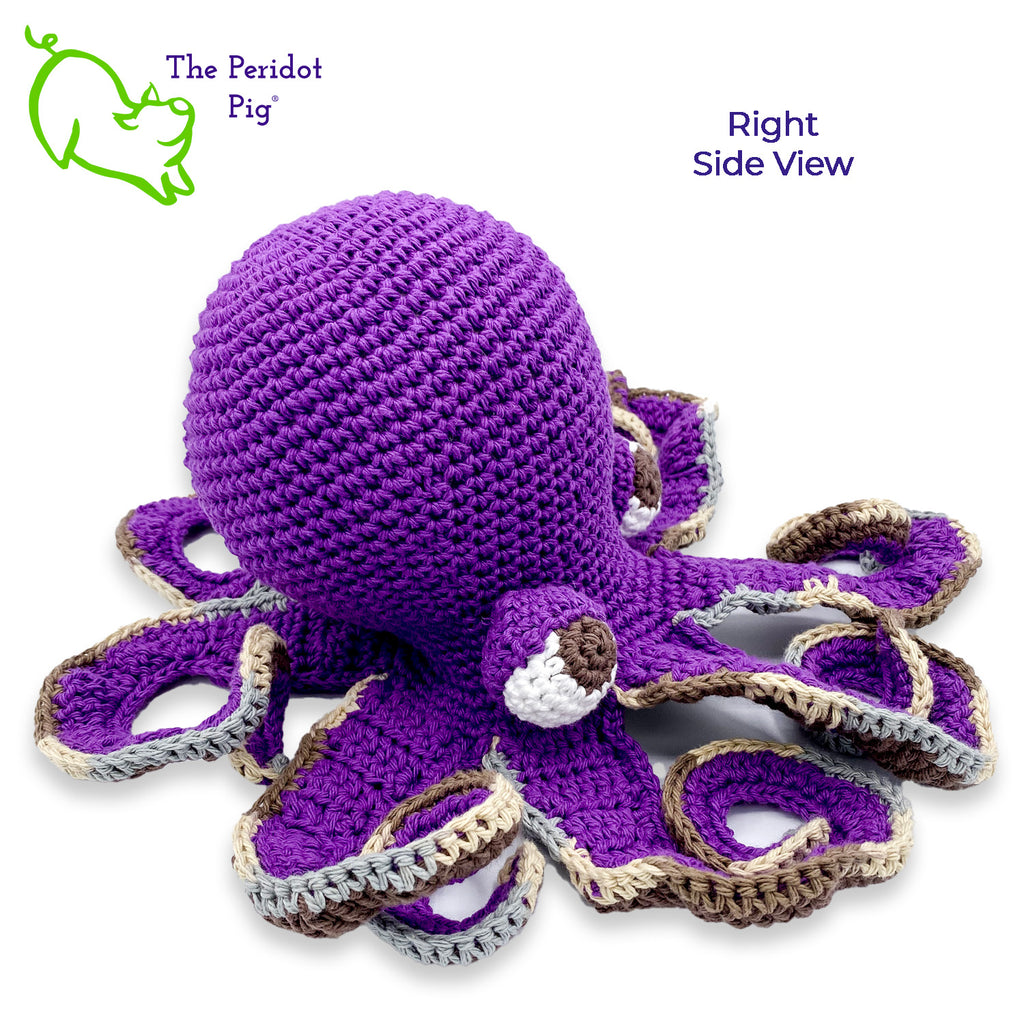 My husband thought an octopus only comes in black but we begged to differ! The North Pacific Giant Octopus is a lovely shade of orange like our Olivia. At first glance, she's a bit intimidating but in reality, she is soft and cuddly. Olivia is made from sturdy cotton and is meant to last a life-time. Also available in a purple too! Right view shown in purple.