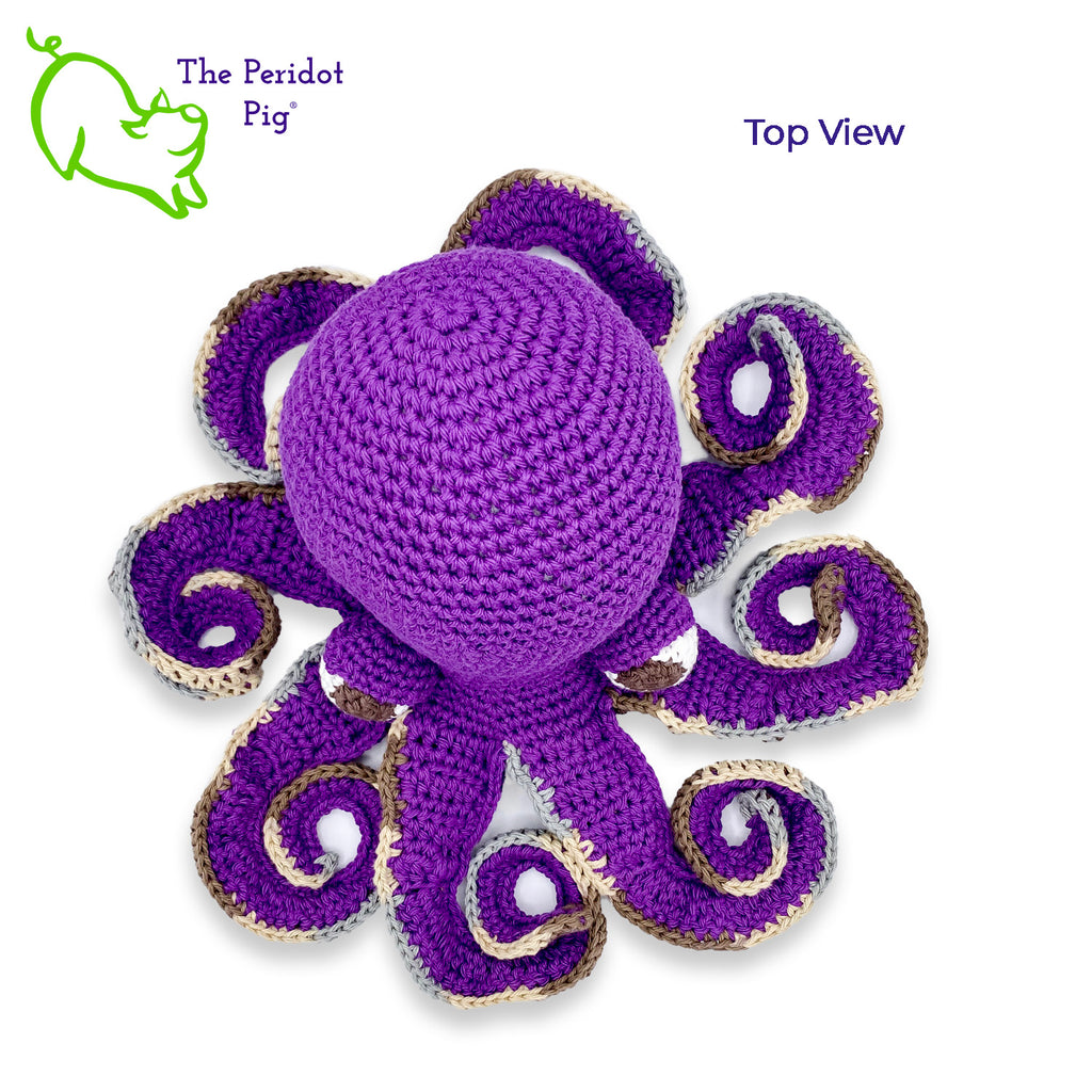 My husband thought an octopus only comes in black but we begged to differ! The North Pacific Giant Octopus is a lovely shade of orange like our Olivia. At first glance, she's a bit intimidating but in reality, she is soft and cuddly. Olivia is made from sturdy cotton and is meant to last a life-time. Also available in a purple too! Top view shown in purple.