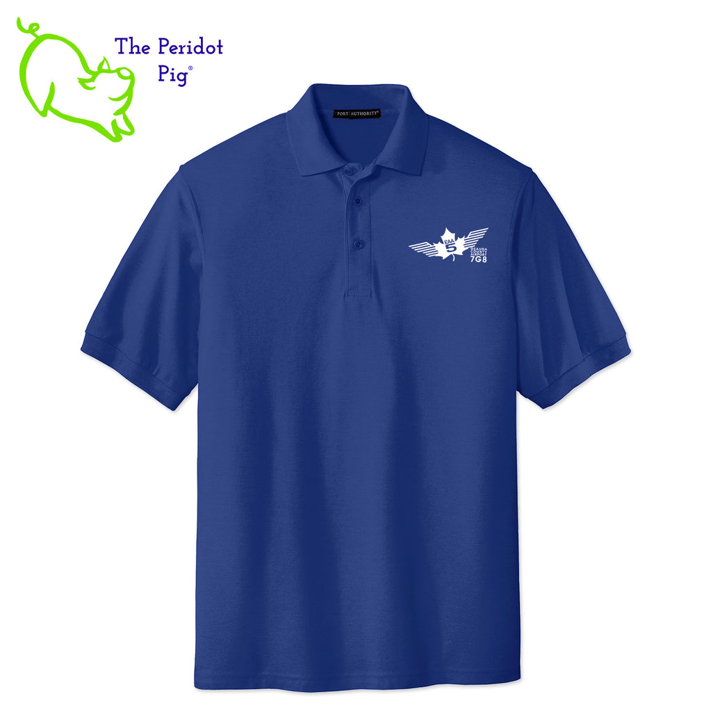 Renowned for its resilience, our incomparably comfortable classic polo is second to none. Expertly designed to resist wrinkles and shrinkage, this must-have polo delivers a luxuriously soft feel. Featuring the iconic EAA Chapter 5 logo on the left chest, you won't ever regret choosing this timeless piece. Front view shown in Royal-White.