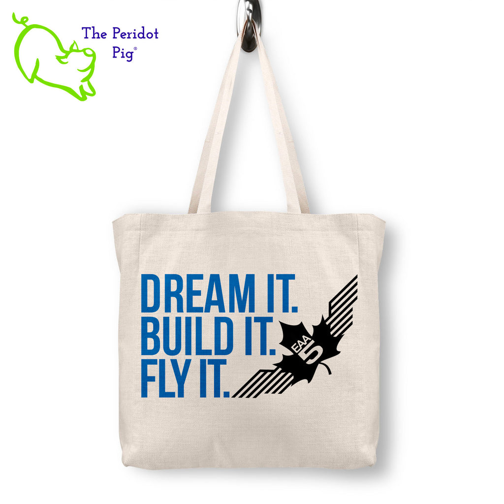 Step out in style with the stylish, spacious EAA Chapter 5 Dream It. Build It. Fly It. Logo Tote-- designed with a sublimated print that won't wear away, and a vivid logo on the front. The back side is left blank for a polished look. Perfect for carrying around everything you need in sturdy, long-lasting fashion. Front view shown.