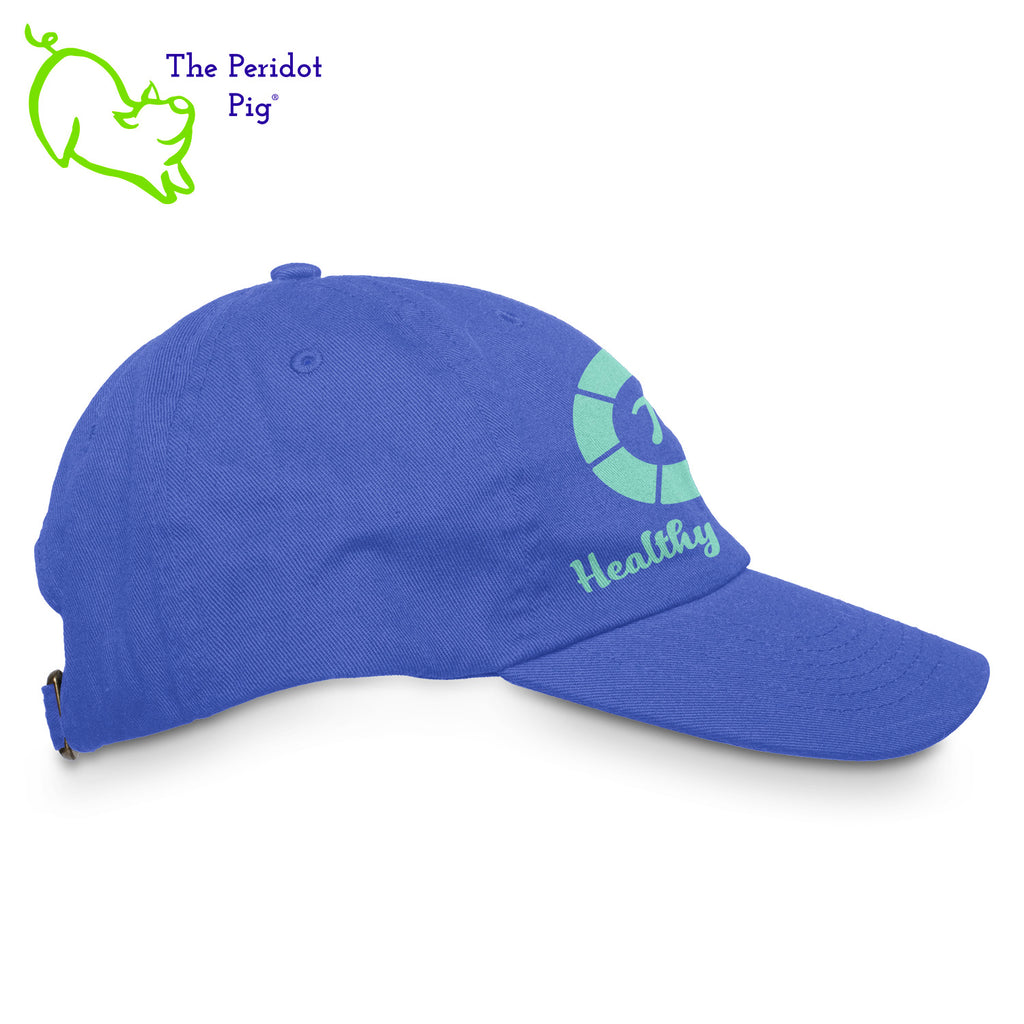 Stay shaded and stay styling with the Healthy Pi Logo Dad Hat! This 6-Panel twill cap is one cool customer - perfect for adding a bit of chill to your look and keeping the 'pony' under wraps. Available in FIVE colors, you'll be 'hat-happy' no matter which you choose! Right view shown in royal.