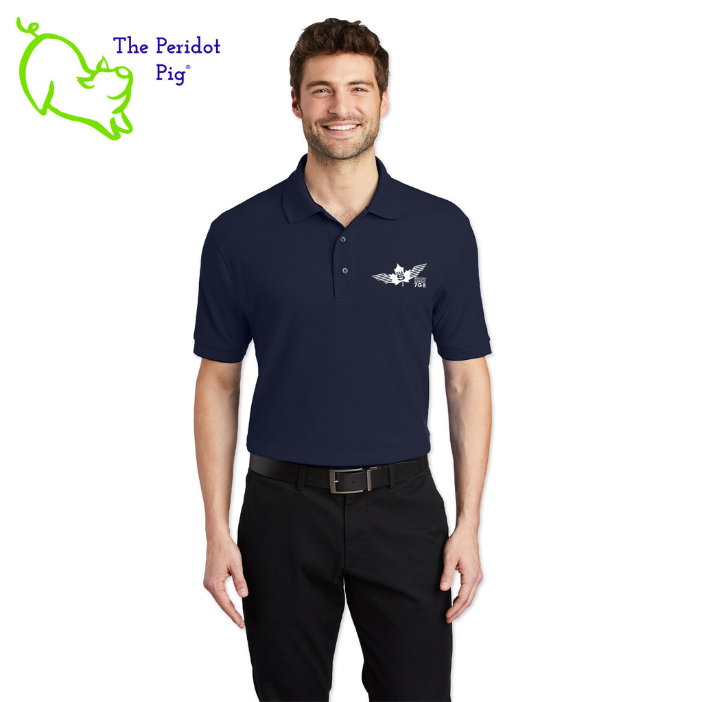 Renowned for its resilience, our incomparably comfortable classic polo is second to none. Expertly designed to resist wrinkles and shrinkage, this must-have polo delivers a luxuriously soft feel. Featuring the iconic EAA Chapter 5 logo on the left chest, you won't ever regret choosing this timeless piece. Front view shown in Navy-White.