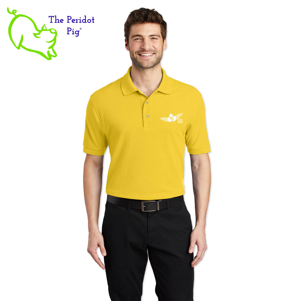 Renowned for its resilience, our incomparably comfortable classic polo is second to none. Expertly designed to resist wrinkles and shrinkage, this must-have polo delivers a luxuriously soft feel. Featuring the iconic EAA Chapter 5 logo on the left chest, you won't ever regret choosing this timeless piece. Front view shown in Yellow-White.