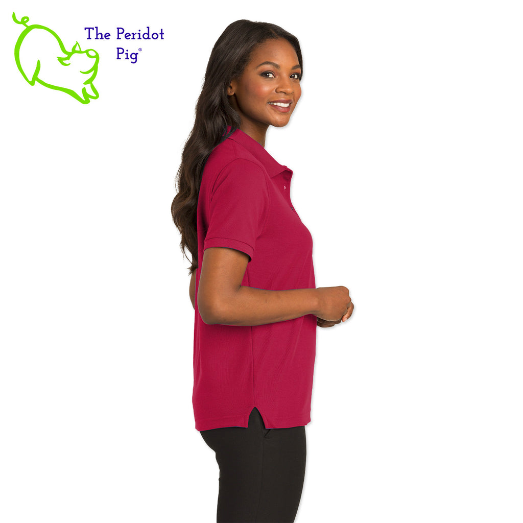 Renowned for its resilience, our incomparably comfortable classic polo is second to none. Expertly designed to resist wrinkles and shrinkage, this must-have polo delivers a luxuriously soft feel. Featuring the iconic EAA Chapter 5 logo on the left chest, you won't ever regret choosing this timeless piece. Side view shown in Red.
