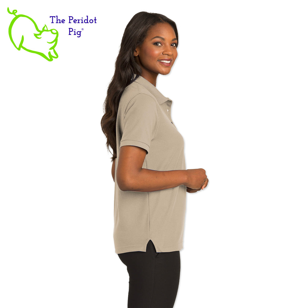 Renowned for its resilience, our incomparably comfortable classic polo is second to none. Expertly designed to resist wrinkles and shrinkage, this must-have polo delivers a luxuriously soft feel. Featuring the iconic EAA Chapter 5 logo on the left chest, you won't ever regret choosing this timeless piece. Side view shown in Stone.