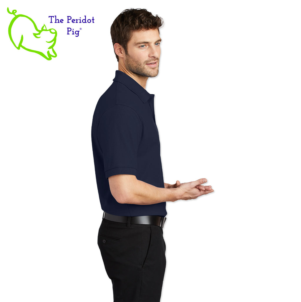 Renowned for its resilience, our incomparably comfortable classic polo is second to none. Expertly designed to resist wrinkles and shrinkage, this must-have polo delivers a luxuriously soft feel. Featuring the iconic EAA Chapter 5 logo on the left chest, you won't ever regret choosing this timeless piece. Side view shown in Navy.