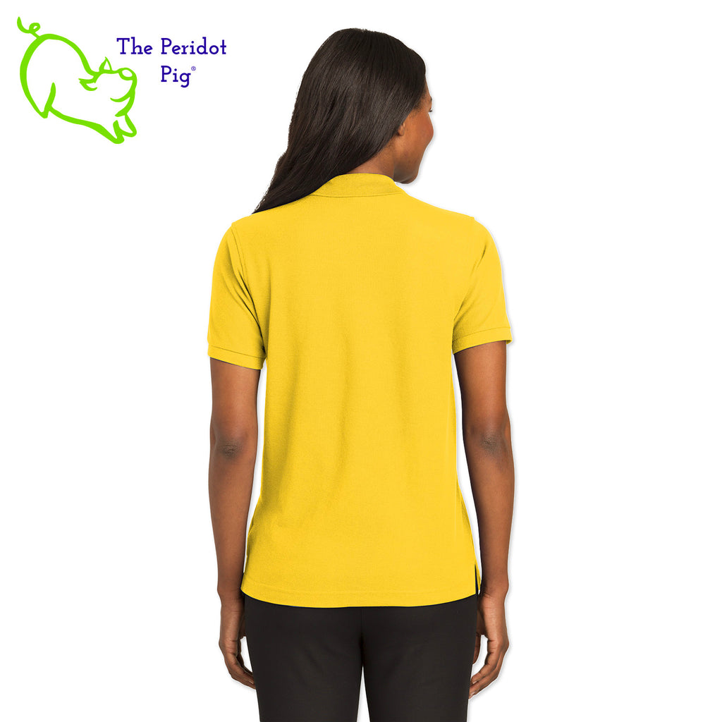 Renowned for its resilience, our incomparably comfortable classic polo is second to none. Expertly designed to resist wrinkles and shrinkage, this must-have polo delivers a luxuriously soft feel. Featuring the iconic EAA Chapter 5 logo on the left chest, you won't ever regret choosing this timeless piece. Back view shown in Yellow.
