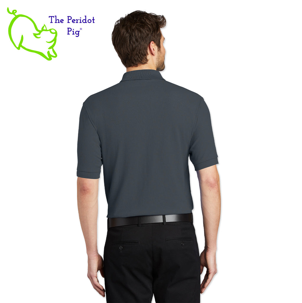 Renowned for its resilience, our incomparably comfortable classic polo is second to none. Expertly designed to resist wrinkles and shrinkage, this must-have polo delivers a luxuriously soft feel. Featuring the iconic EAA Chapter 5 logo on the left chest, you won't ever regret choosing this timeless piece. Back view shown in Charcoal.