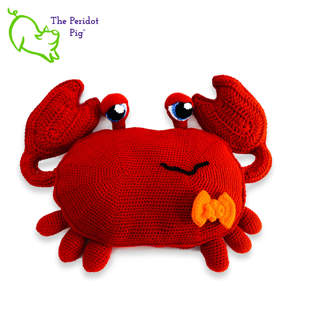 Clarke is a really large amigurumi pillow! Some think he can be a bit terse but he's really the life of the party. Those eyes pop up and just seem to say, "Hellloooooo!" He's dressed for the occasion with his spiffy little bow tie. Front view shown.