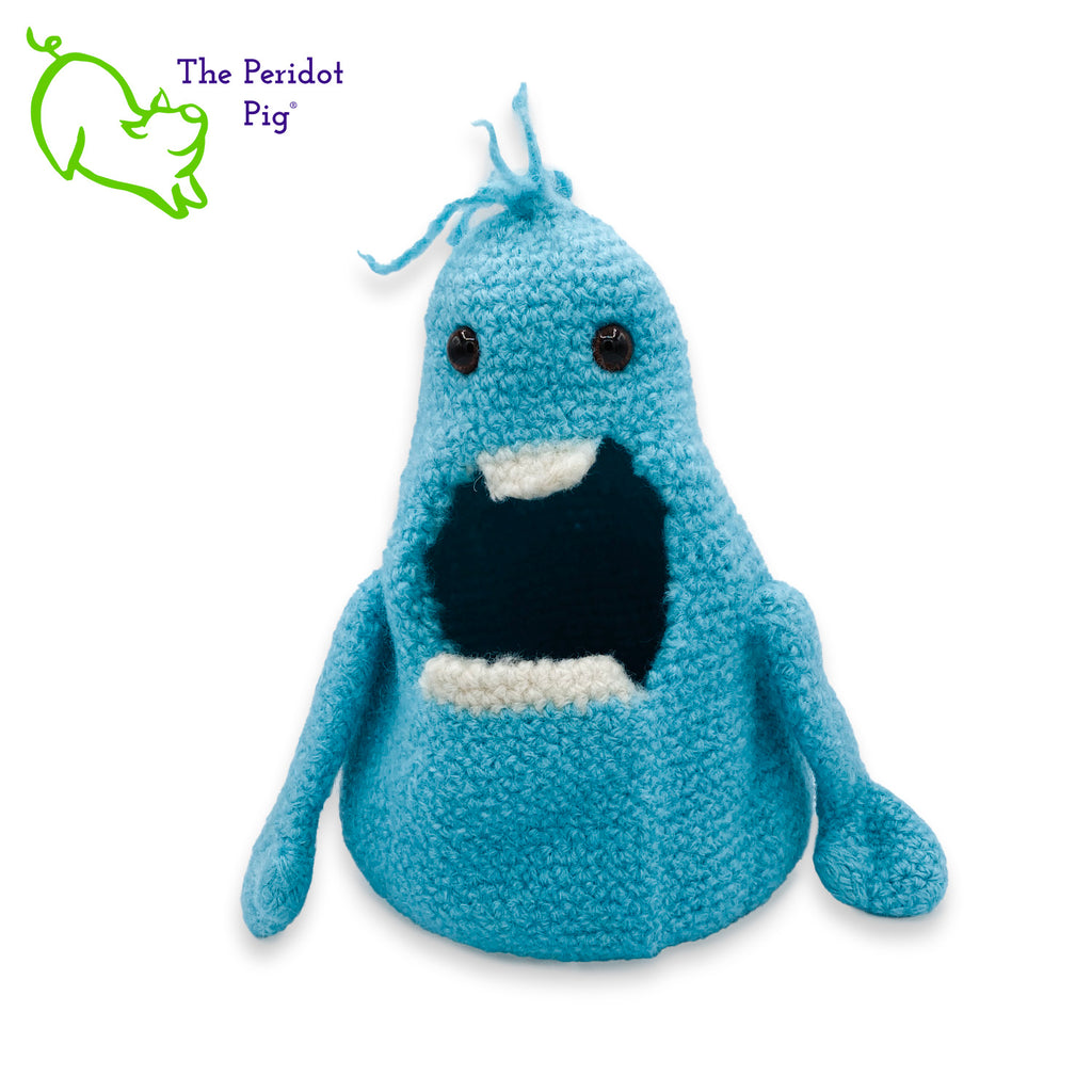 Glenda has a big mouth! She's not loud though...she just likes to cram stuff in her big mouth. She prefers candy but you could easily fill her with anything.  Her dream is to show up in a kid's Easter basket one day. Definitely needs to be a special kid that appreciates little monsters like Glenda or Gary. She's made of 100% wool that has been felted down to create her hollow body. Her arms are floppy and she has a little tuft of his turquoise blue hair on top.  Her eyes are a deep brown. Front view shown.