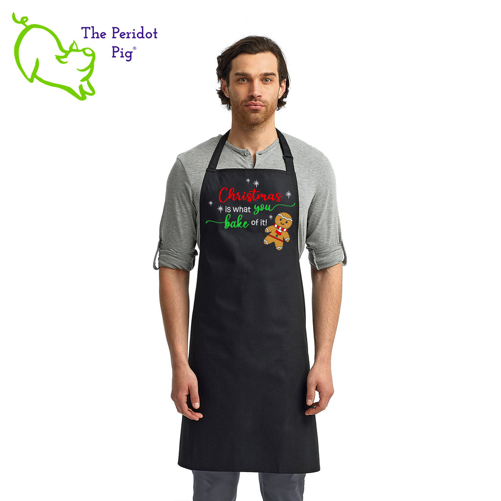 Looking for a special gift for the baker in your life? Here's a fun Christmas treat for them! The front says, "Christmas is what you bake of it" in bright festive colors. There are sparkly silver stars and a cute ginger bread man.  Front view shown in black.