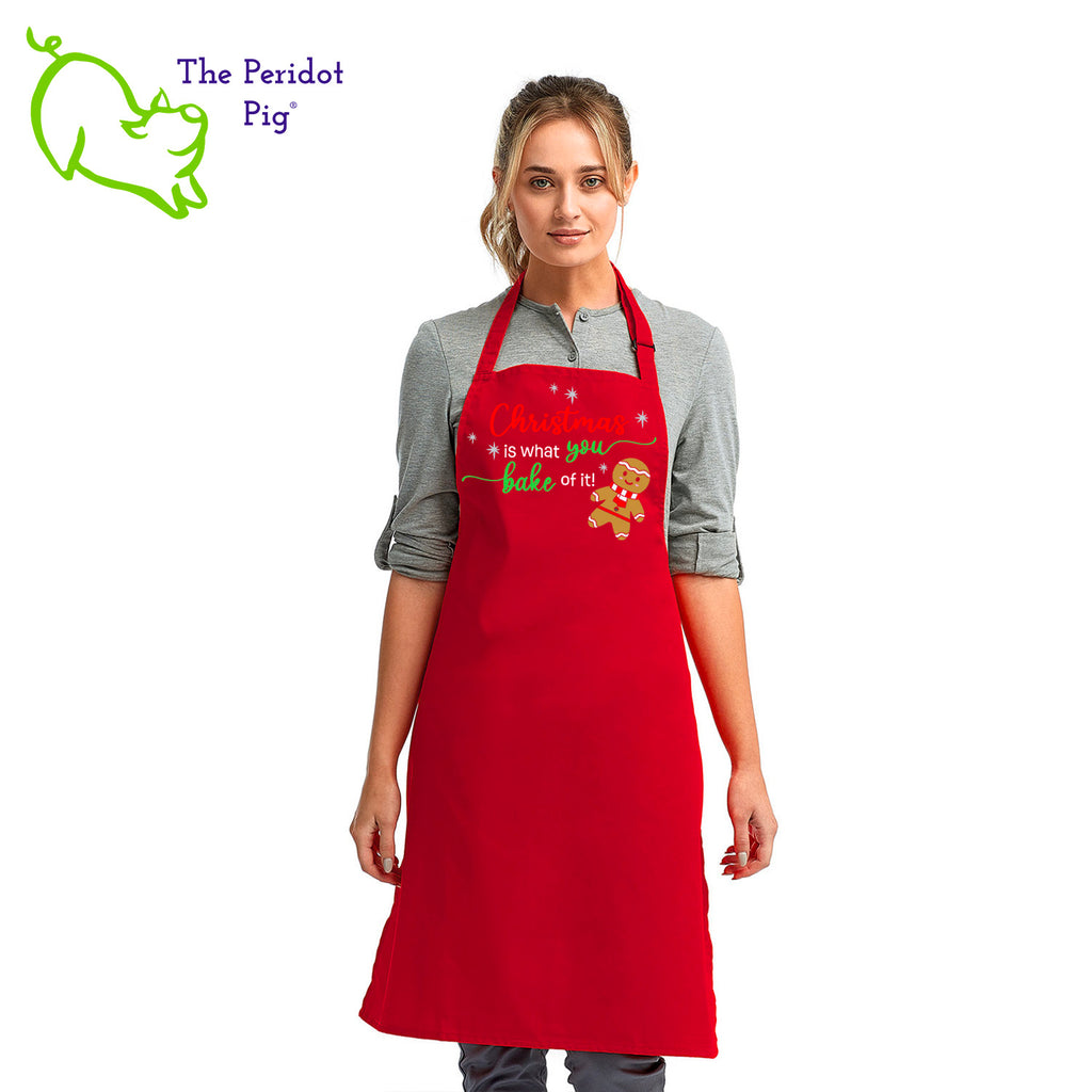 Looking for a special gift for the baker in your life? Here's a fun Christmas treat for them! The front says, "Christmas is what you bake of it" in bright festive colors. There are sparkly silver stars and a cute ginger bread man.  Front view shown in red.