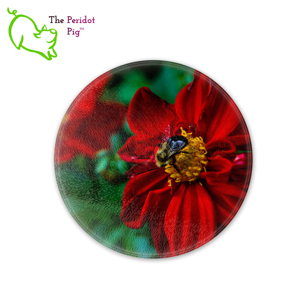 This beautiful tempered glass cutting board is a wonderful keepsake!  This one features bright red flowers with a cute little honey bee in a vivid and detailed print. Perfect for cutting or using as a serving board! Front view.