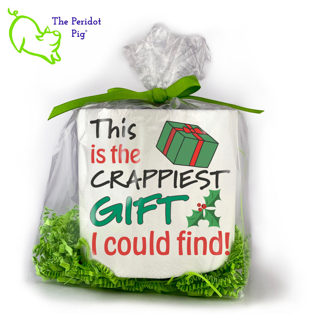 Available with many different sayings, this is high-quality 2-ply toilet paper which has been printed in vivid sublimation color. We then wrap it all up with some peridot green crinkle paper and a matching bow. This version states "This is the crappiest gift I could find" with a little package off to the side. Front view.