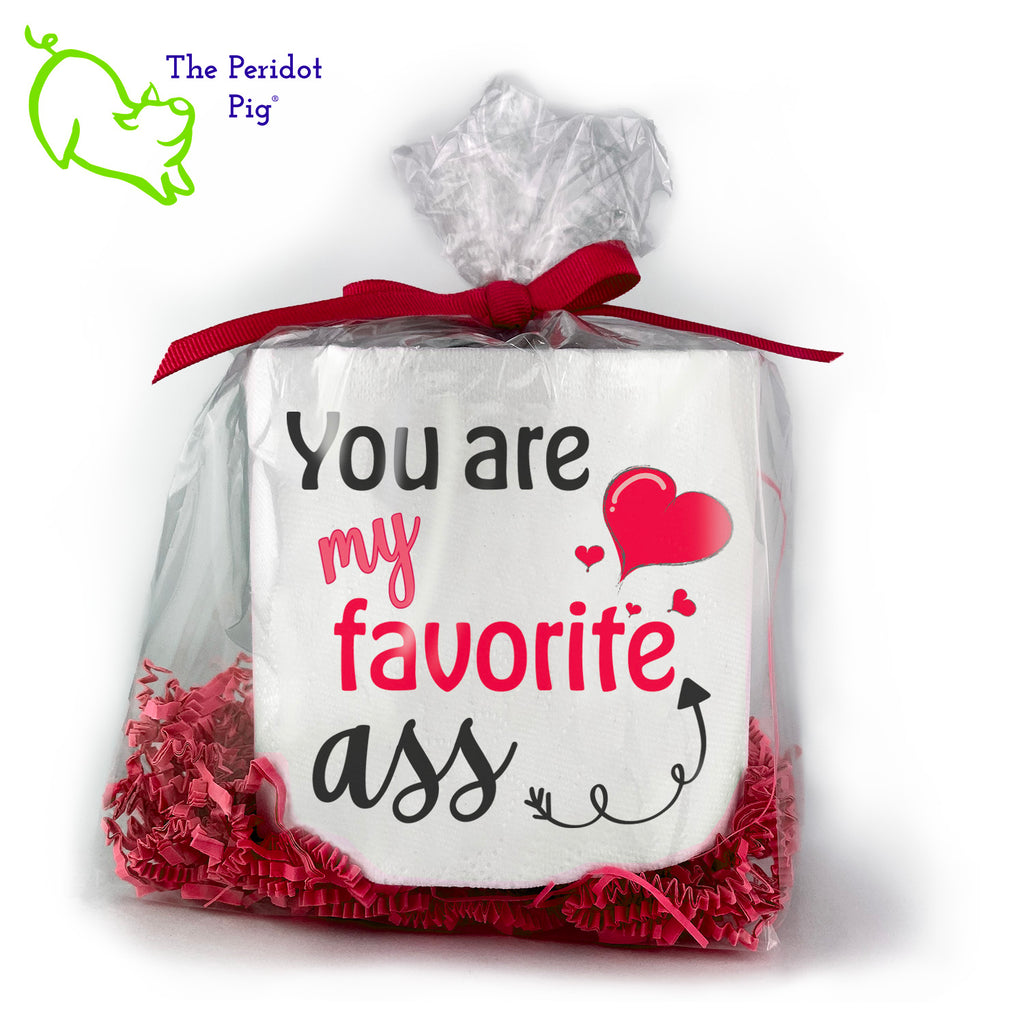 Toilet paper is still a thing and we're sure they'll appreciate an extra roll. As they say...sharing is caring! Available with many different sayings, this is high-quality 2-ply toilet paper which has been printed in vivid sublimation color. We then wrap it all up with some red crinkle paper and a matching bow. This version states "You are my favorite ass" in bright colors. It's decorated with hearts and an arrow. Front view shown.