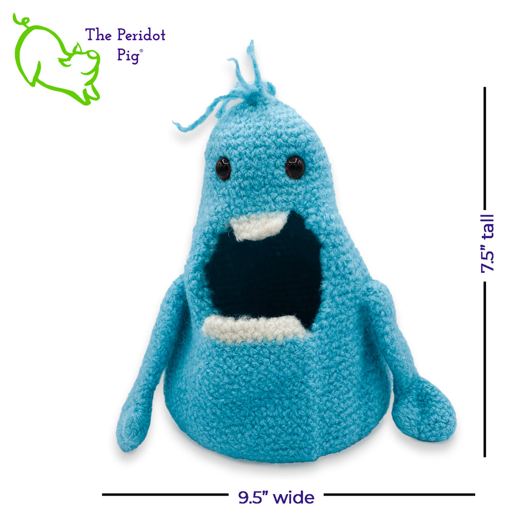 Glenda has a big mouth! She's not loud though...she just likes to cram stuff in her big mouth. She prefers candy but you could easily fill her with anything. Her dream is to show up in a kid's Easter basket one day. Definitely needs to be a special kid that appreciates little monsters like Glenda or Gary. She's made of 100% wool that has been felted down to create her hollow body. Shown with dimensions.