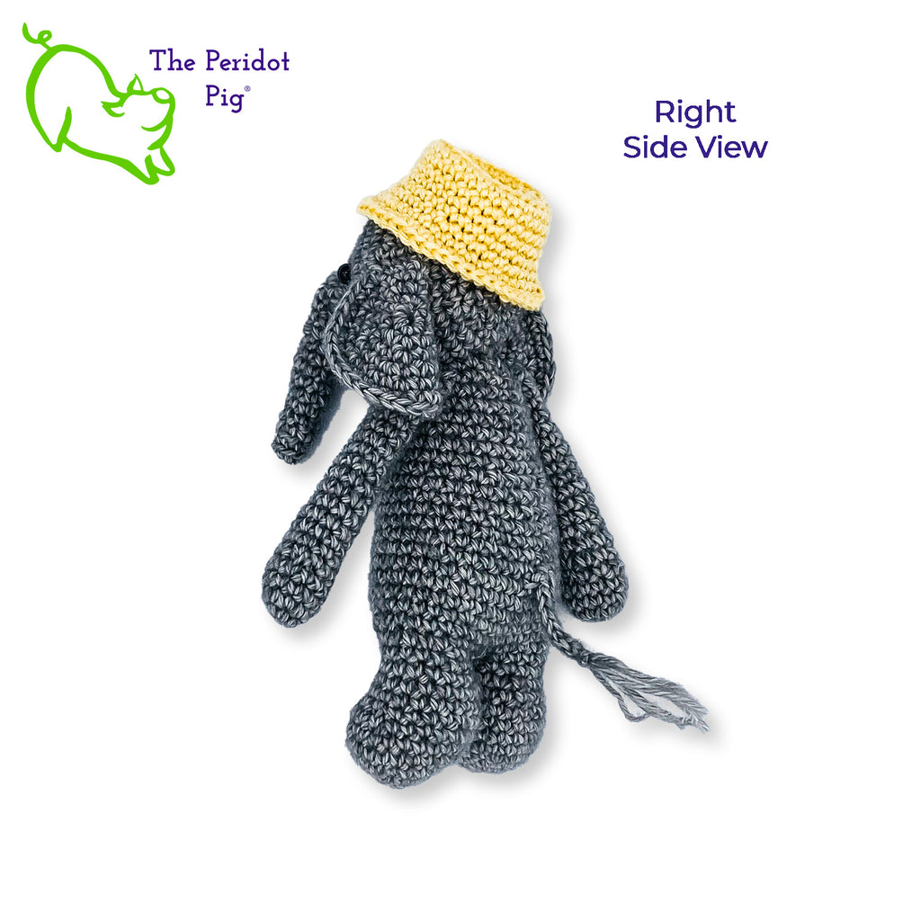 Ollie is sporting a little yellow, dad hat. We really think all elephants should wear a bucket hat. It really becomes him! He's hand crocheted out of a soft cotton/acrylic blend and will last a lifetime. His cute little hat is tacked on so it won't get lost. Right side view shown.