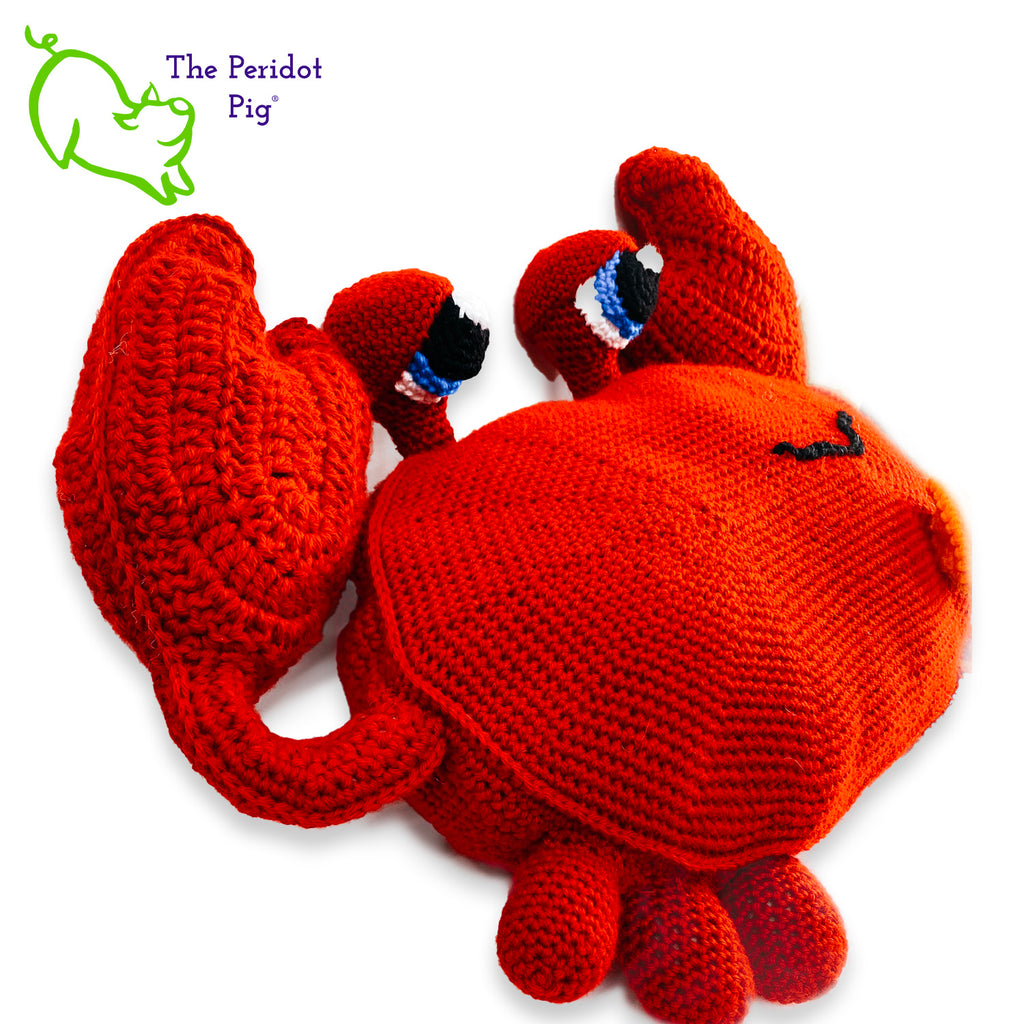 Clarke is a really large amigurumi pillow! Some think he can be a bit terse but he's really the life of the party. Those eyes pop up and just seem to say, "Hellloooooo!" He's dressed for the occasion with his spiffy little bow tie. Right view shown.