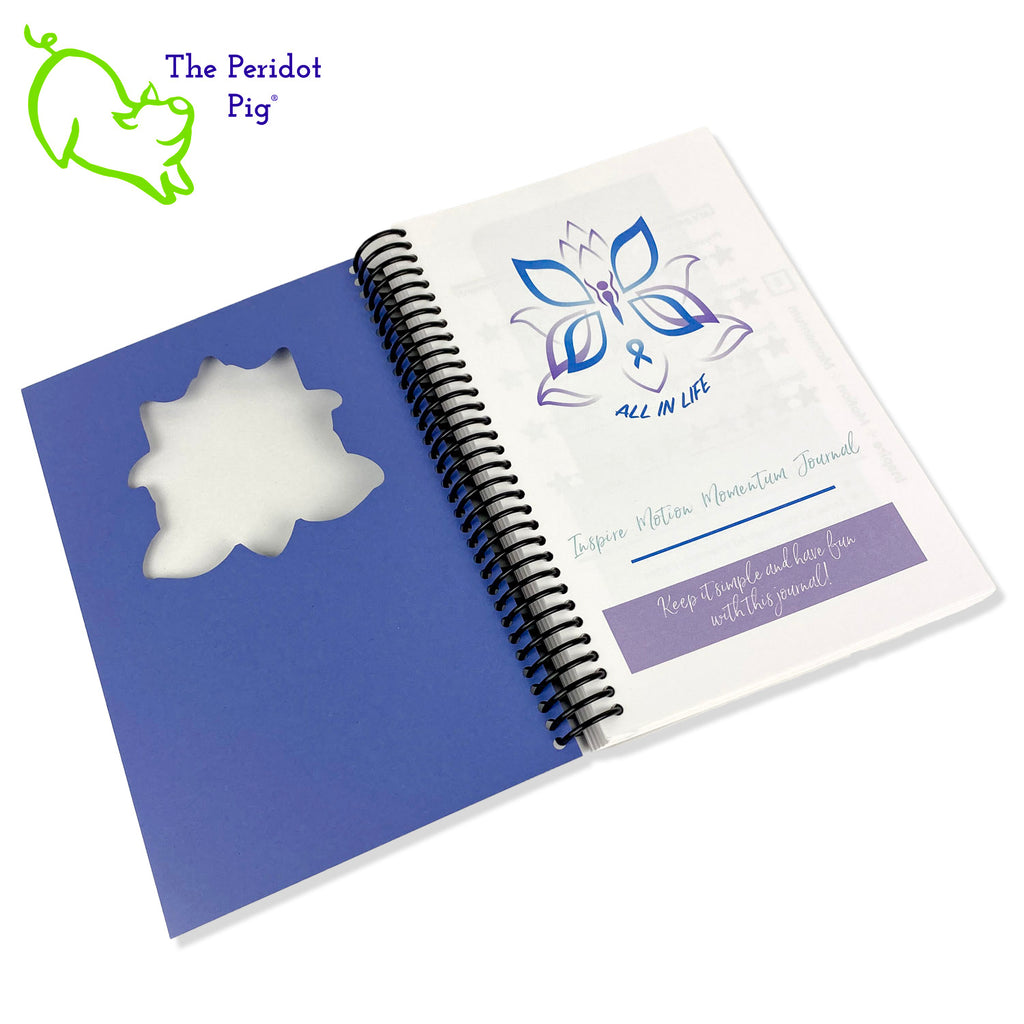 The journal is printed on 32 bond 5.5 x 8" paper which is a joy to write in. Colorful pages and illustrations help lay out your monthly, weekly and daily plans. The front cover is a beautiful wisteria purple with a cutout around her logo. The back is a navy cover stock. All of the 250 pages are bound in a spiral coil allowing the journal to lie flat or fold back.  Inside front cover view.