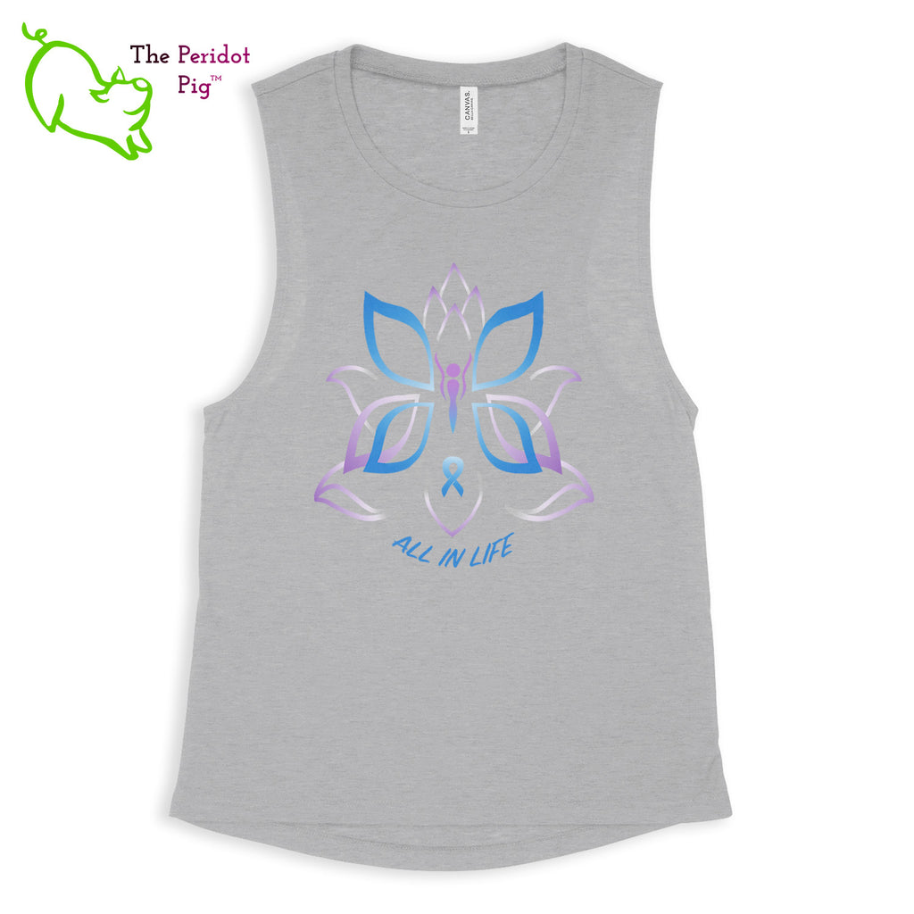 This comfortable muscle tank is soft and flowy with low cut armholes for a relaxed look. The shirt features Kristin Zako's logo on the front in bright blue and purple colors. The back is blank. The print is a translucent, faded "vintage" look due to the blend of the fabric. Front view in Heather Athletic.