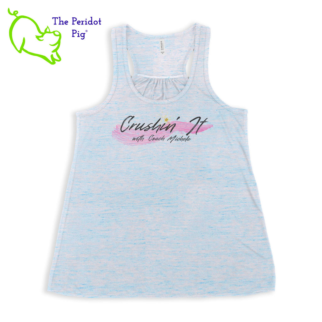 The front features Coach Michele Smits' Crushin' It! logo and the back is blank. There's also a small gold, glitter star over the "i" because everyone needs a little sparkle! The print will be in a "vintage" look that is slightly faded on the white, pink and athletic heather versions. On the marble colors, the print is a little more vivid. Front view in Blue Marble.