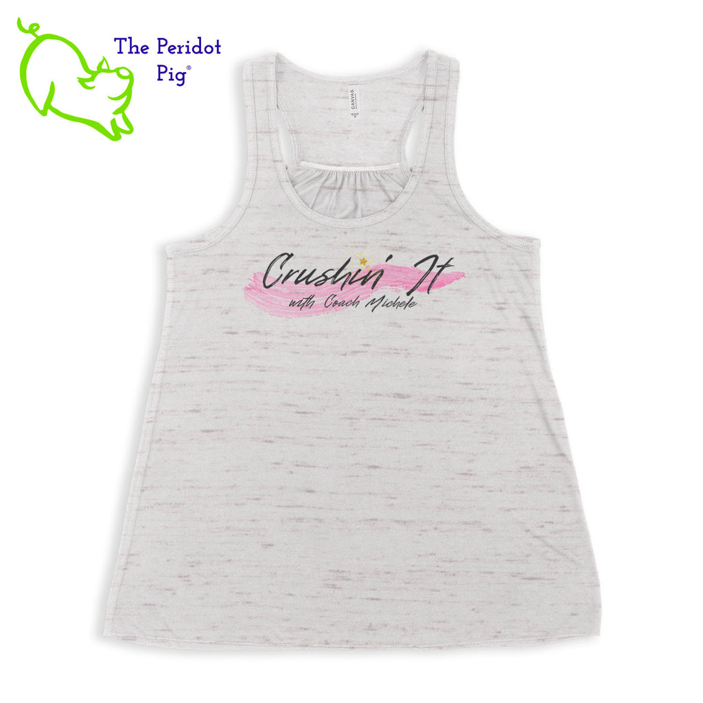 The front features Coach Michele Smits' Crushin' It! logo and the back is blank. There's also a small gold, glitter star over the "i" because everyone needs a little sparkle! The print will be in a "vintage" look that is slightly faded on the white, pink and athletic heather versions. On the marble colors, the print is a little more vivid. Front view in White Marble.