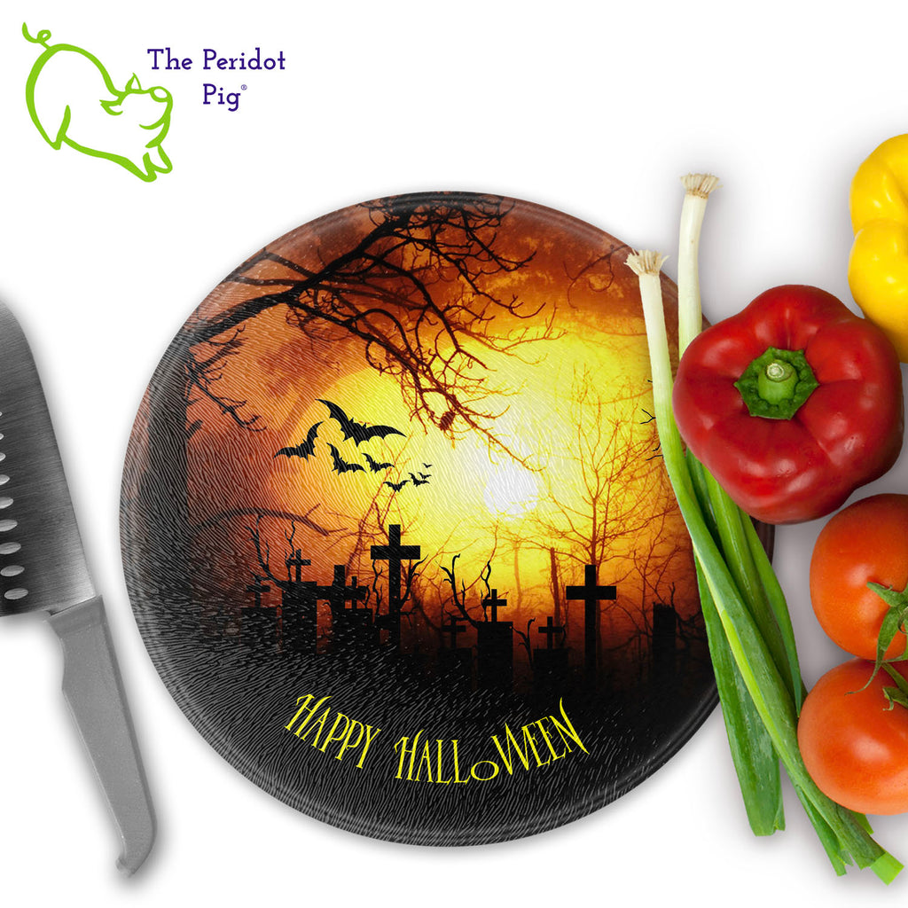 How about a Halloween cutting board for your next party? These make a perfect birthday, holiday or house warming gift! We've designed these with a dark graveyard scene. "Happy Halloween" is printed in a bright orange. They are printed in permanent sublimation colors that are vivid and bright. 12" round version shown with veggies.