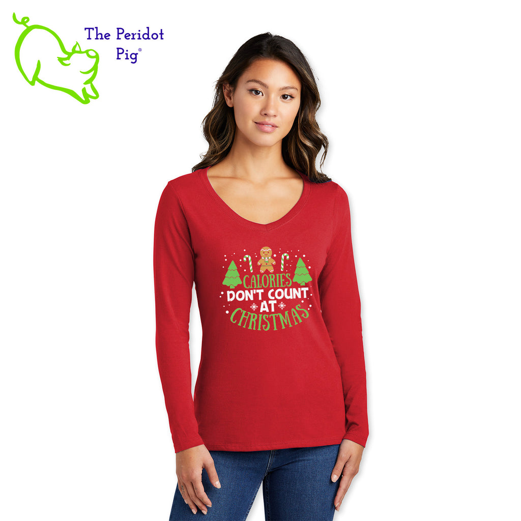 Calories don't count for free food and at Christmas. That's my story and I'm sticking to it! If you abide by this rule, here's the perfect t-shirt for you.  You'll be the biggest fan of this 100% ring spun cotton tee. It's very soft and tailored for a woman's fit. The front says, "Calories don't count at Christmas" in bright festive colors. There are trees, candy canes, a gingerbread man and snow flakes to round out the design. The back is undecorated. Front view shown in Red.
