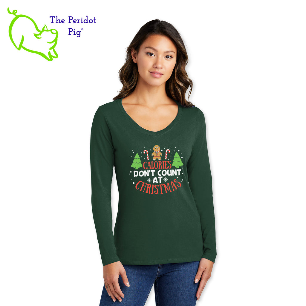 Calories don't count for free food and at Christmas. That's my story and I'm sticking to it! If you abide by this rule, here's the perfect t-shirt for you.  You'll be the biggest fan of this 100% ring spun cotton tee. It's very soft and tailored for a woman's fit. The front says, "Calories don't count at Christmas" in bright festive colors. There are trees, candy canes, a gingerbread man and snow flakes to round out the design. The back is undecorated. Front view shown in Green.