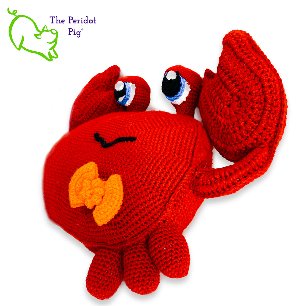 Clarke is a really large amigurumi pillow! Some think he can be a bit terse but he's really the life of the party. Those eyes pop up and just seem to say, "Hellloooooo!" He's dressed for the occasion with his spiffy little bow tie. Left view shown.