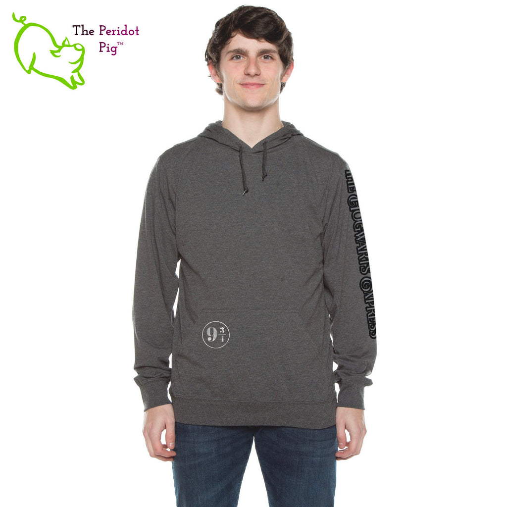 We created this shirt for that Harry Potter Fan Girl/Boy that might be looking for something a bit more subtle. We use a long sleeve t-shirt hoodie is a light-weight version of your classic pullover hoodie. The front features a small version of the 9 3/4 platform number on the pocket. The back is blank and the left sleeve has "The Hogwarts Express" in a tone on tone flowing font. Front view.