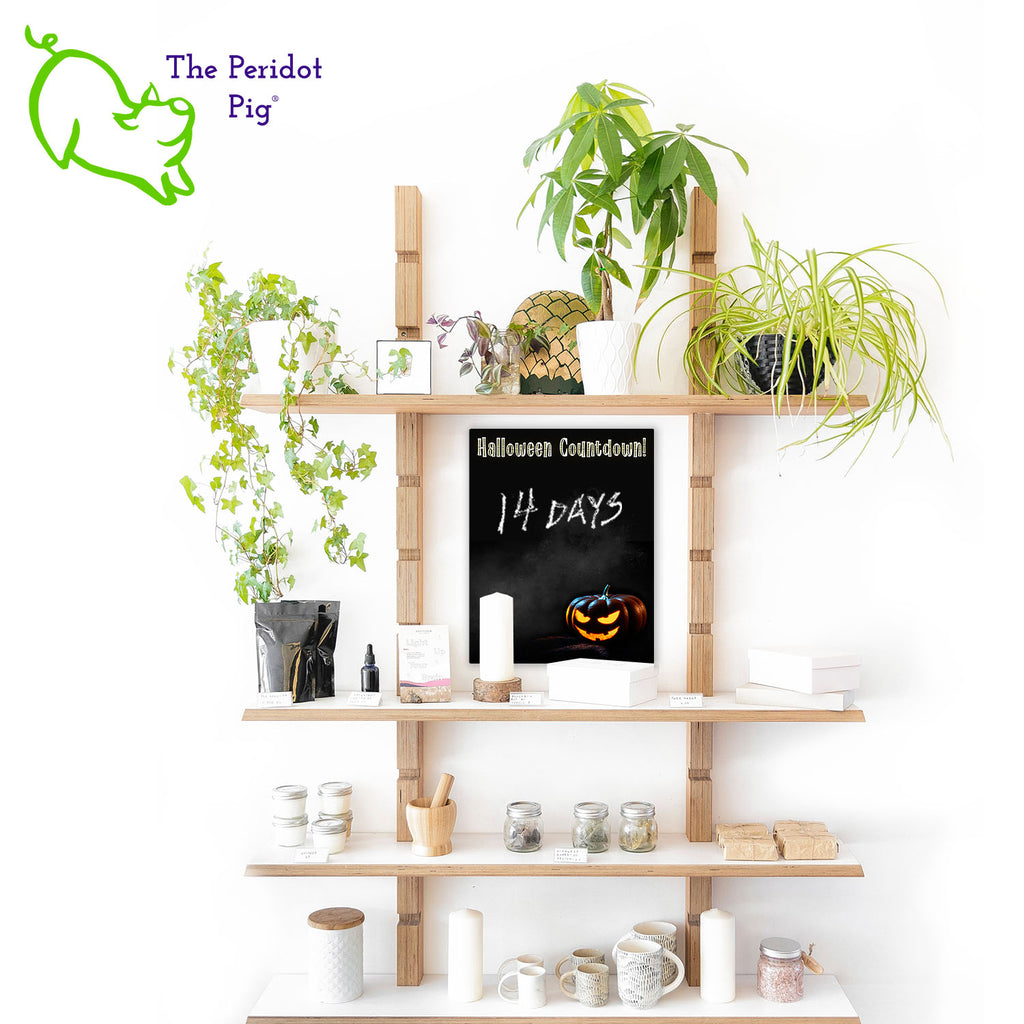 Some people live for Halloween and others (like me!) never bother to take down their spooky decorations. Here's a new product that will help you track when the big day is soon to arrive. Style C: Shows a grinning jack-o-lantern with a smoky background. There is space above for you to add in the remaining months, weeks and/or days along with any other notes you might want to jot down on the chalkboard. At the top, it says "Halloween Countdown!".