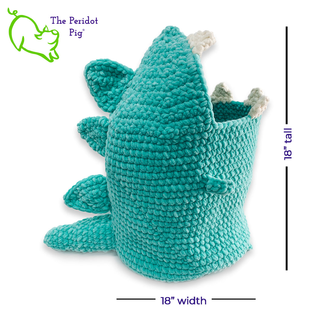 Hear Tiffany roar! Luckily she looks more menacing than reality. She's soft and plush from being made with a soft poly chenille. She just wants a hug but she has these little tiny arms which make it hard. Even her teeth and spikes are soft! As you can see, Tiffany has a big mouth that can hold a lot of toys, towels, clean diapers, even toilet paper (we put in 9 double rolls!). Right view shown with dimensions.