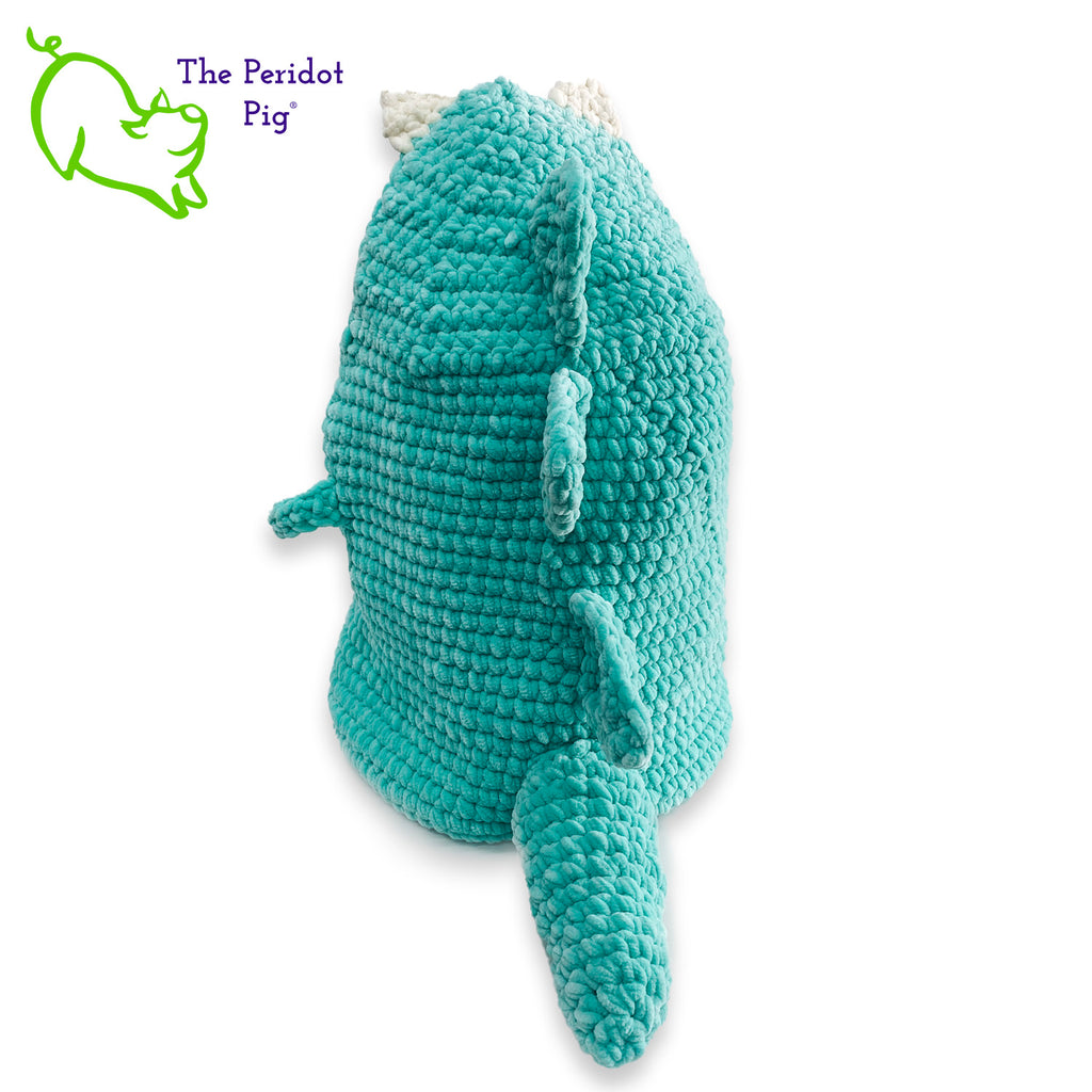 Hear Tiffany roar! Luckily she looks more menacing than reality. She's soft and plush from being made with a soft poly chenille. She just wants a hug but she has these little tiny arms which make it hard. Even her teeth and spikes are soft! As you can see, Tiffany has a big mouth that can hold a lot of toys, towels, clean diapers, even toilet paper (we put in 9 double rolls!). Back view shown.