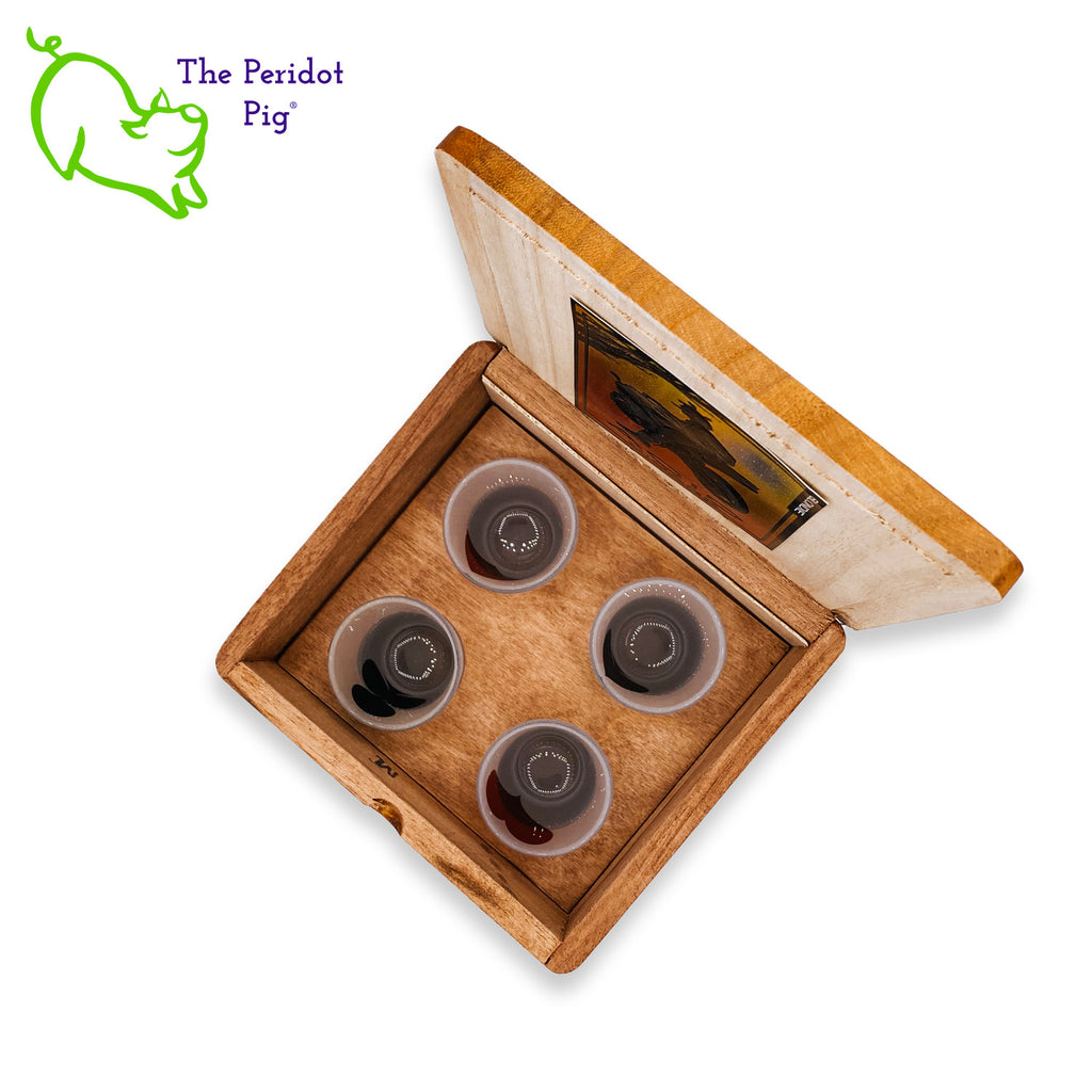 Do you have cigar smoking, card playing, shot drinking kind of friend?? Here's the perfect gift for them! We've taken a gently used cigar box and added a holder for 4 frosted glass shot glasses. We've then printed a spade, club, diamond and heart on the front of each shot glass. Top view with four glasses shown.