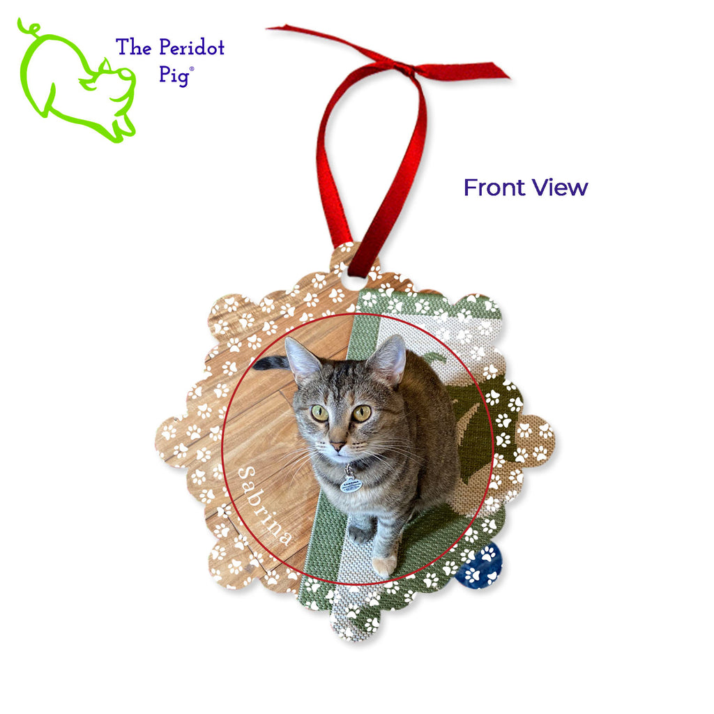Create a beautiful keepsake ornament for the holidays! These aluminum ornaments can be printed in vivid color with the photo or artwork of your own choice. Both sides can be customized. The ornament is light weight for hanging on the tree and comes with a ribbon hanger. We've shown them here with the year on the back with a fun Christmas candy stripe pattern. On the front, choose from 5 different border styles. Shown front view with cat paws border.