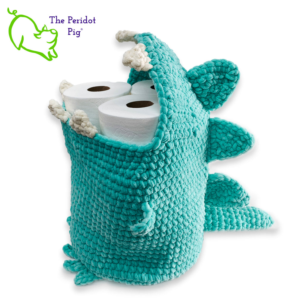 Hear Tiffany roar! Luckily she looks more menacing than reality. She's soft and plush from being made with a soft poly chenille. She just wants a hug but she has these little tiny arms which make it hard. Even her teeth and spikes are soft! As you can see, Tiffany has a big mouth that can hold a lot of toys, towels, clean diapers, even toilet paper (we put in 9 double rolls!). Left view shown filled with toilet paper.