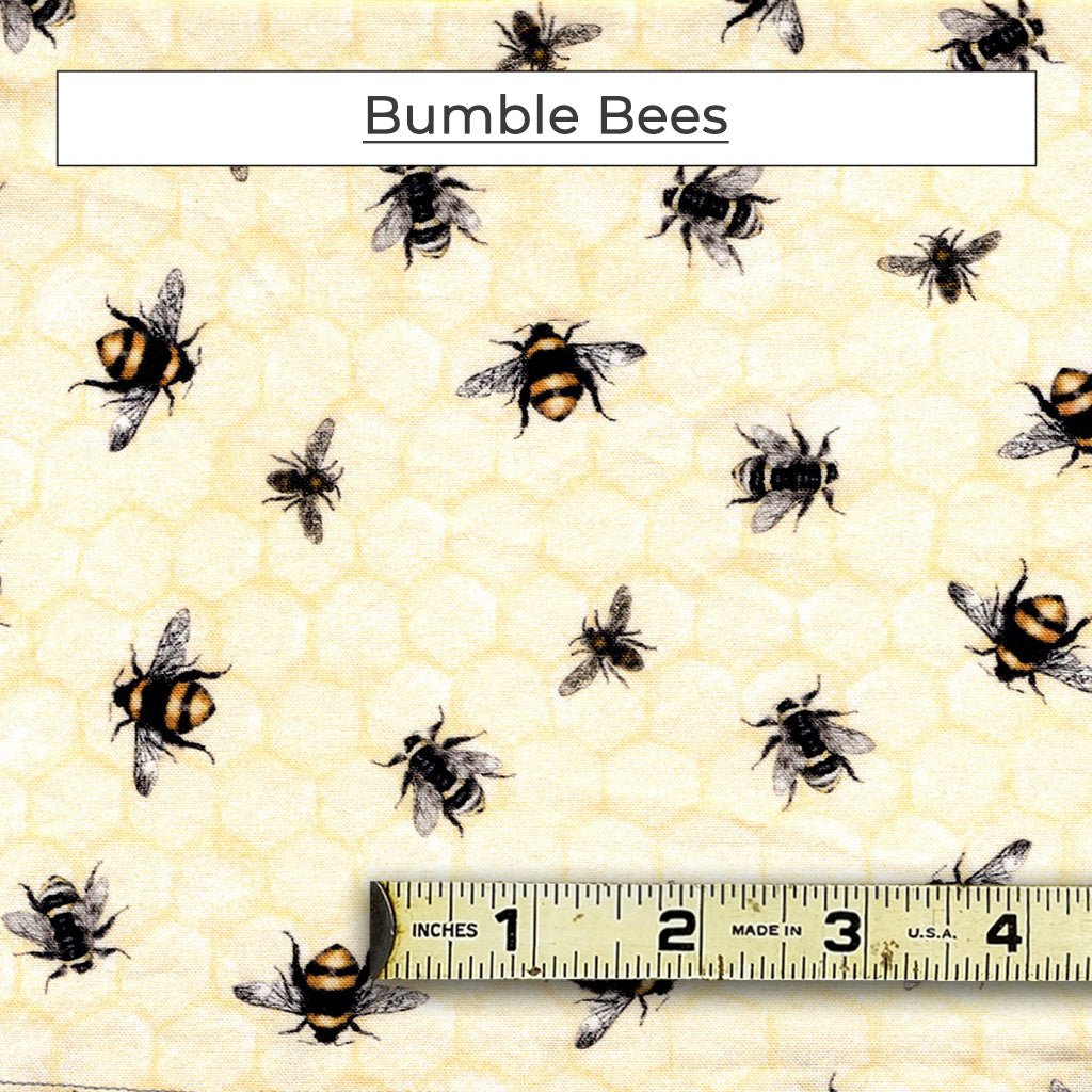 A selection of various bumble bees on a pale yellow, honey comb background. Called Bumble Bees.