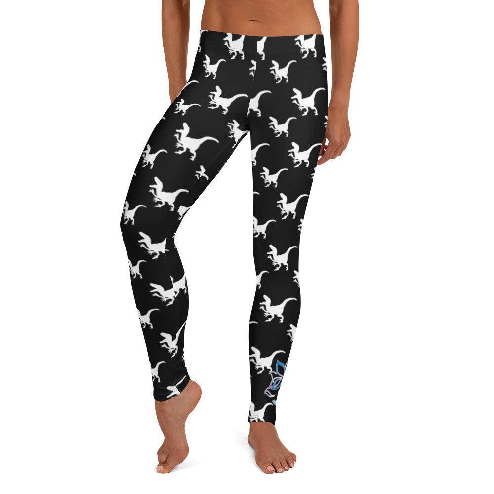 Kristin Zako embodies the "Wild & Free" spirit of her print leggings. These are extra special as they are printed in black and white color with a velociraptor silhouette.  The words, "WILD & FREE" are down the right leg and you'll find Kristin's logo on the lower left leg. Front view.