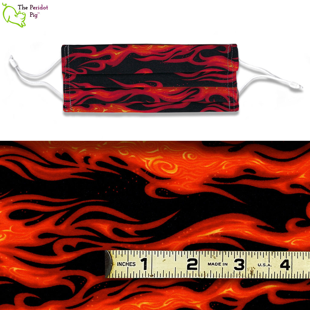 A view showing the mask and the scale of the pattern. A mixed color fabric with horizontal orange and red flames called Dragon's Breath