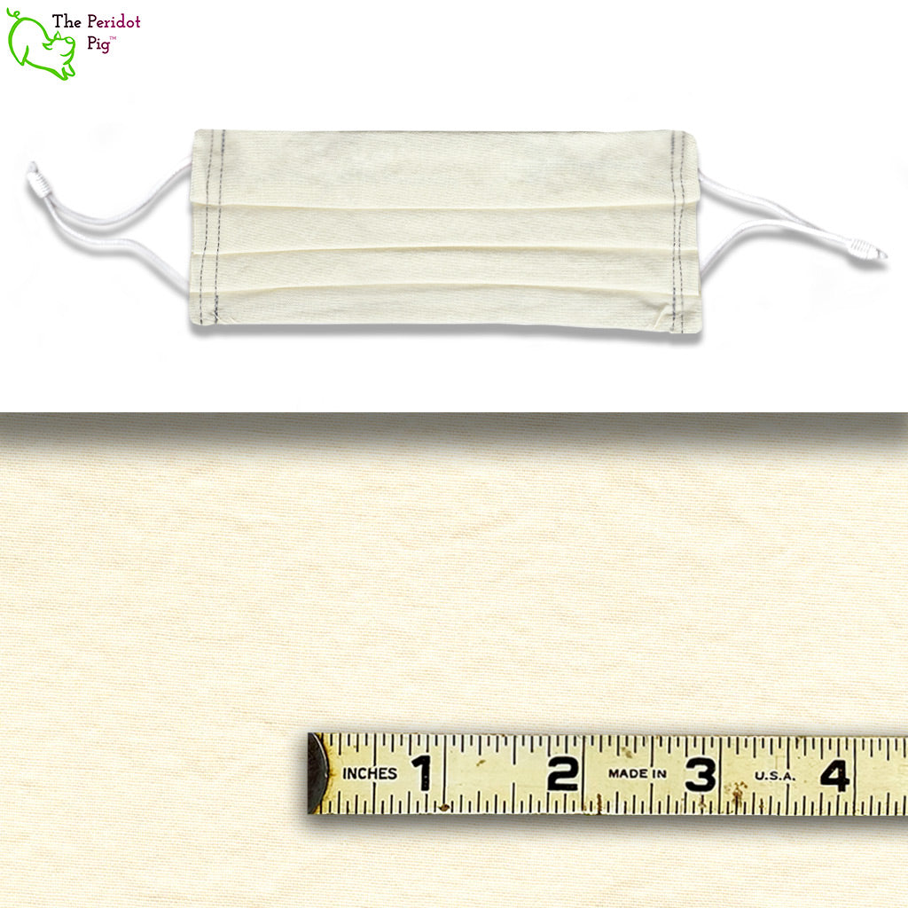 View shows a mask and a scale view of the fabric. Shown in Ivory.