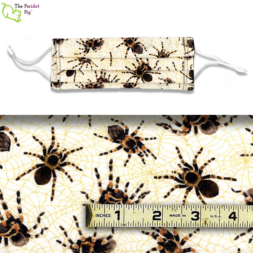 The Spiders fabric has tarantula spiders on an ivory background with golden spider webs.